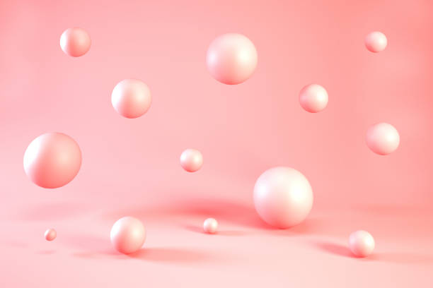 istock Coral balls on light pink background. 3d Pink bubbles or spheres backdrop, 3d render. 1766976025
