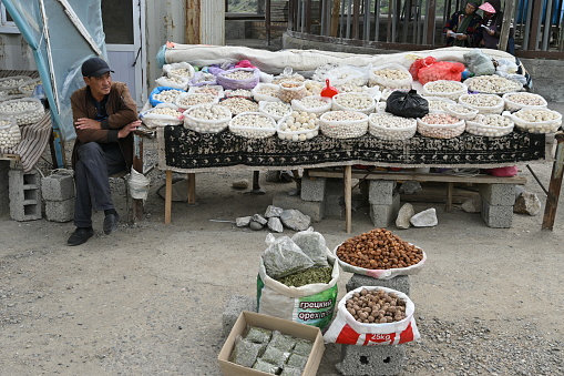 Shahrisabz, Uzbekistan - April 08, 2023 - Kurt is a caloric dairy product of Central Asian nomads, dried in natural conditions, something in between a salted dried curds and a hard young cheese in the form of balls of different sizes