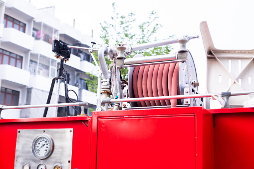 Fire equipment on a red fire truck. Fire trucks are prepared in the event of a fire.