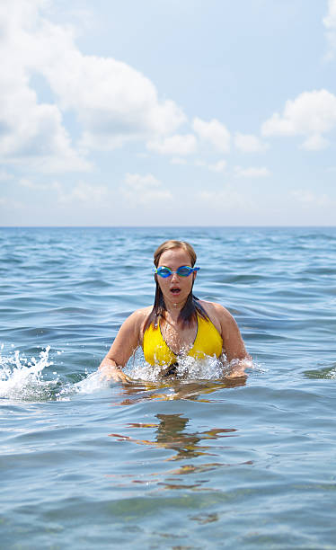 istock Young woman in sea 176697961
