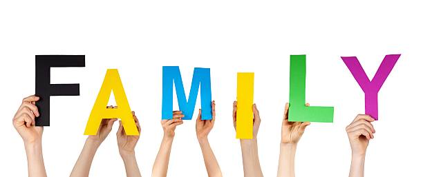istock hands holding the word family 176698575