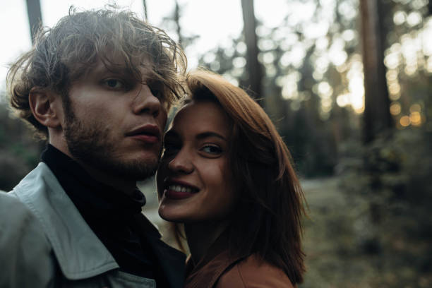 istock happy beautiful couple of lovers taking selfie 1767006247