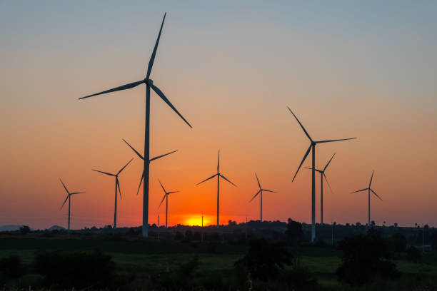 istock Landscape Windmill on a mountain with vast meadows at sunset, beautifully illuminated. 1767009528