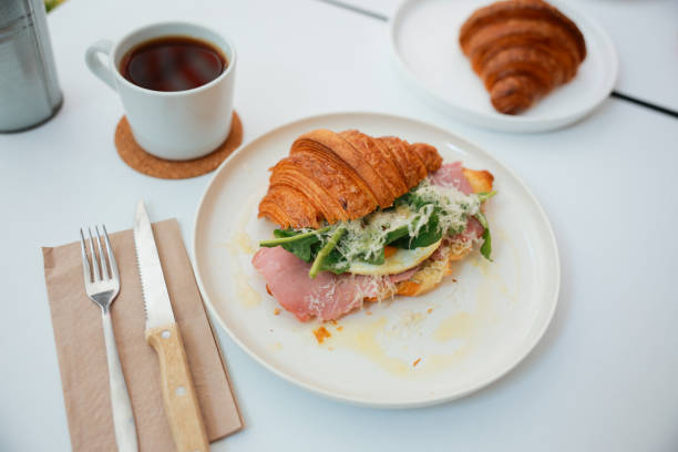 istock Croissant and coffee on top of table 1767028788