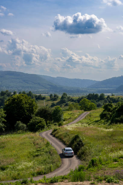 istock road in the mountains, white clouds on the road 1767029859