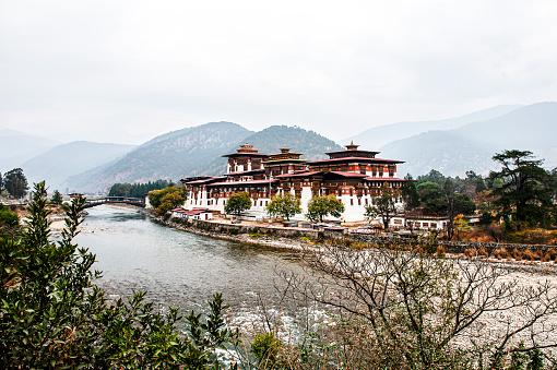 Fortified Buddhist monastery Punaka Dzong, former seat of government of Bhutan, is the second oldest dzong in the country. It is strategically built between the Pho and Mo rivers. In the photo you can see the Pho river.