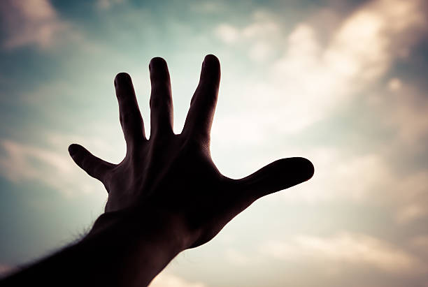 istock Hand of a man reaching to sky. 176703991