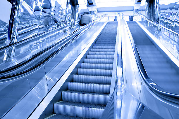 istock moving escalator in airport 176704361