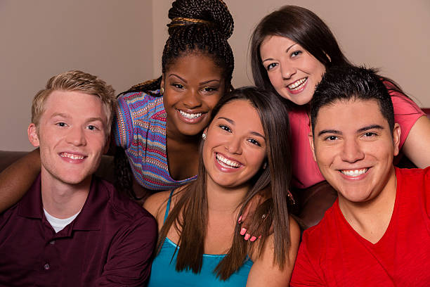 istock Relationships: Five friends hang out together. Laughing. 176707557
