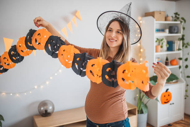 istock Pregnant woman preparing for Halloween 1767087388