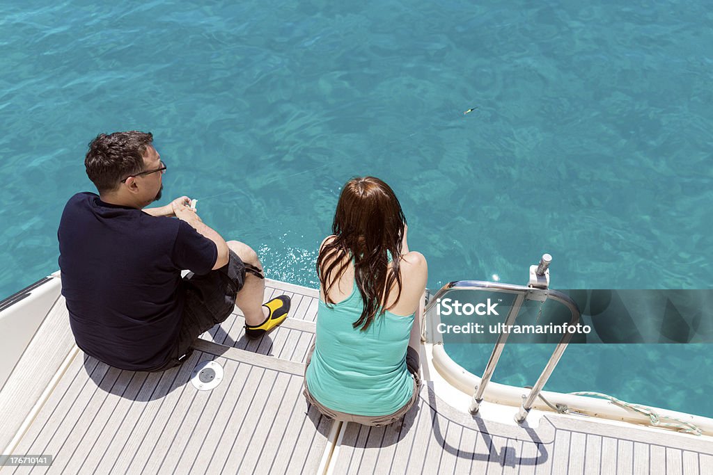 La pêche en mer d'un bleu magnifique - Photo de Deux personnes libre de droits