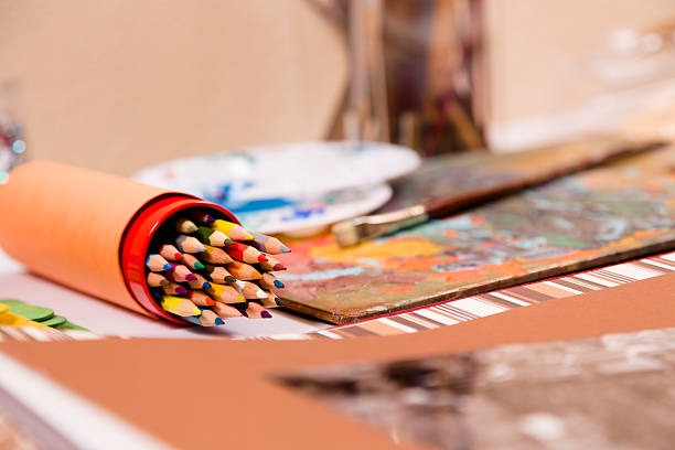 istock Hobbies: Scrapbooking and art supplies on craft work table. 176710278