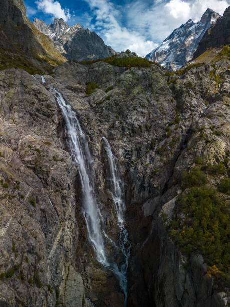 istock Breathtaking landscape featuring a majestic waterfall cascading down a rocky outcrop on Mount Ushba 1767113761