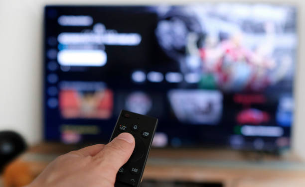 istock Remote control and screen - binge watching the favorite TV show 1767114003