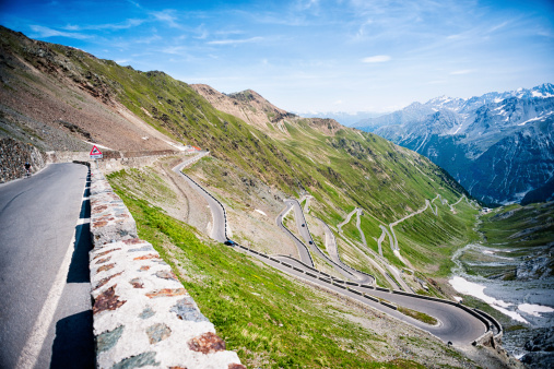 Curving road down the mountain, Italian Dolomites near Stelvio National Park