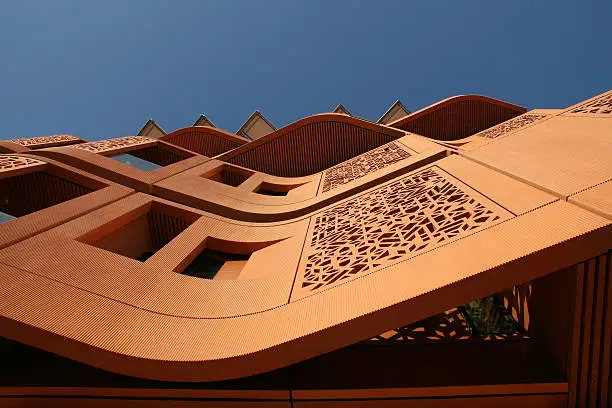 Bottom-up view of a facade in Masdar City in Abu Dahbi, United Arab Emirates.