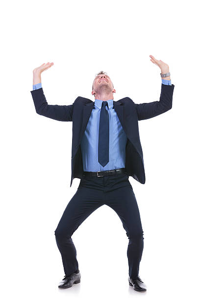 istock business man raises something imaginary 176713361