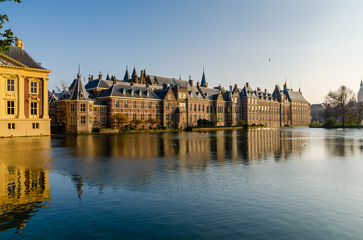The Binnenhof (Dutch Parliament) on Hofvijver lake in the Hague city, South Holland, Netherlands which is one of the oldest Parliament buildings in the world.