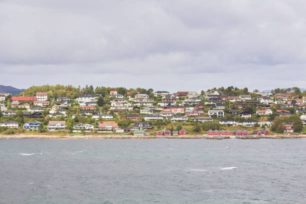 Coastal City Skyline with Oceanfront Buildings and Blue Sky