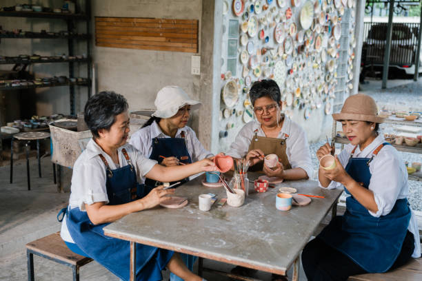 istock Retirement Enjoyment: Group of Senior Women in Pottery Studio 1767168598