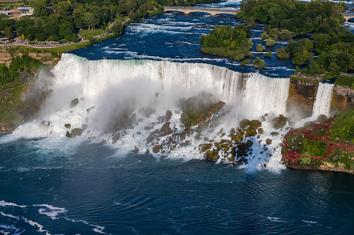 High angle, close-up view of the American falls and the Niagara river in Niagara Falls, Canada