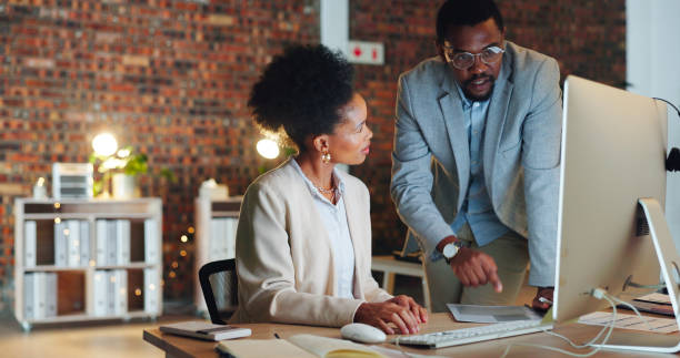 istock Business people, collaboration and work proposal on computer in corporate office. Team, report and agenda or strategy, discussion and teamwork in workplace, documents and planning for project 1767192964