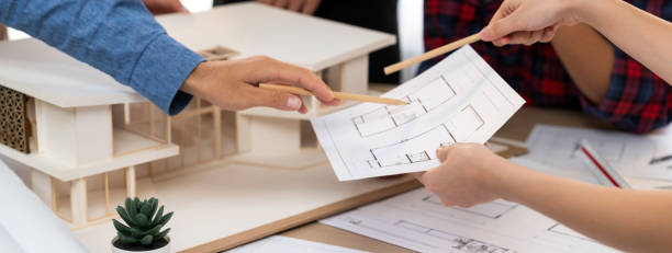 istock Architect team analysis and brainstorming about house construction. Burgeoning. 1767202258