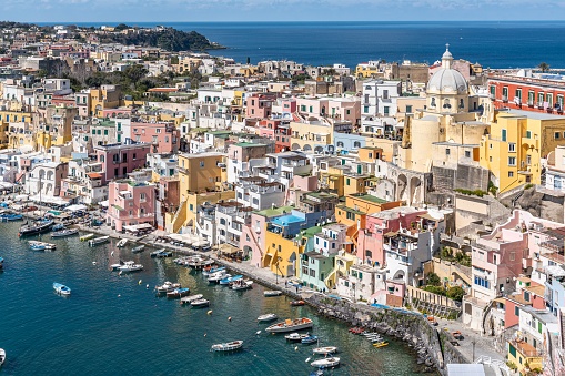 A stunning coastline of the port of Corricella in Procida, famous for its vibrantly colorful housing
