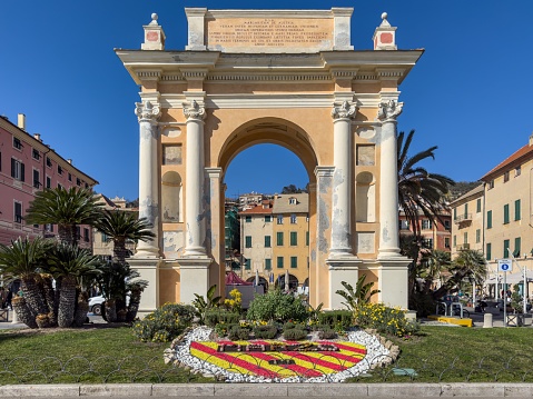 Finale Ligure, Italy – January 03, 2023: The historic triumphal arch in Finale Ligure, Liguria region, Italy
