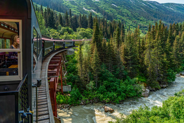 istock White Pass Summit excursion tour train in the mountains, Alaska, USA. 1767223426
