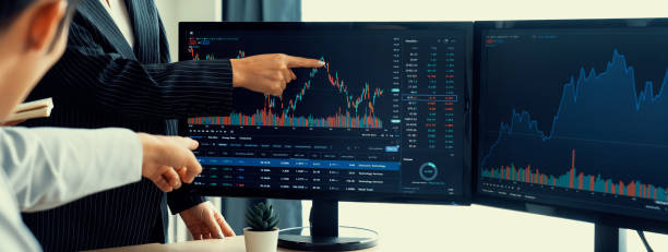 istock Group of profession trader discuss while point the financial graph. Burgeoning. 1767230434