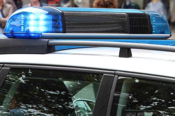 istock police car with active blue emergency vehicle lighting 1767236430