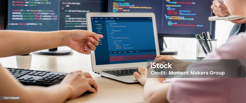 Two Smart Computer Engineers Working Together To Solve Program Code ...
