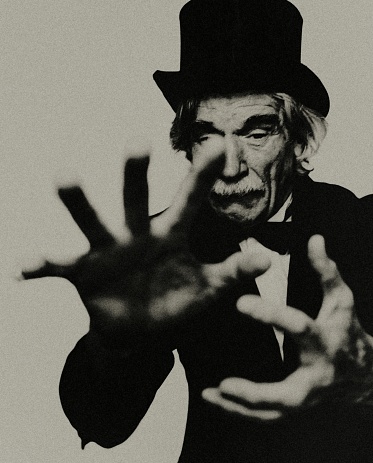 Portrait of an old magician with top hat. Neo-Pictoralism.