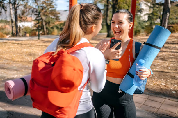 istock Young woman going on exercise class holding exercise mat in hand 1767272650