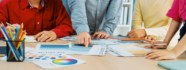 istock Interior designer discuss the color material with her colleagues. Variegated. 1767274245