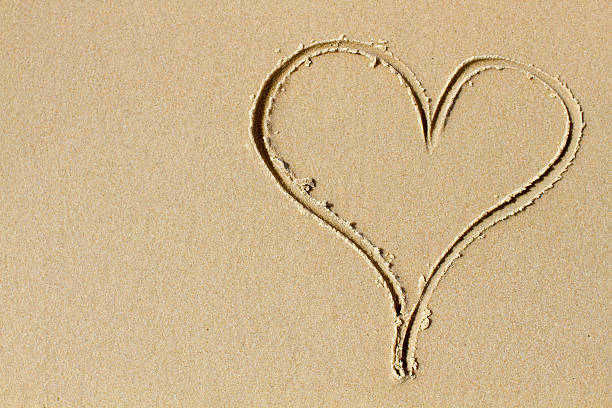 istock Heart of sand and love 176727707