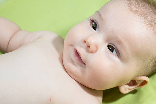 Cute 6 months old baby Cute 6 months old baby portrait smiling. 6 11 months stock pictures, royalty-free photos & images