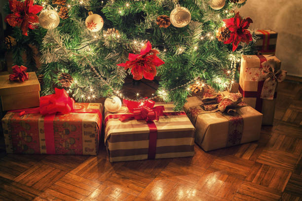 istock Wrapped gifts under the Christmas tree 1767308383