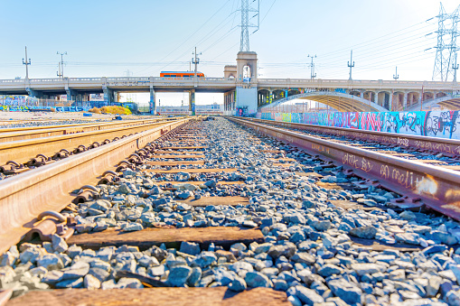 Los Angeles, California – January 21, 2023: Wide-angle view of the railroad tracks and the 1st Street Viaduct