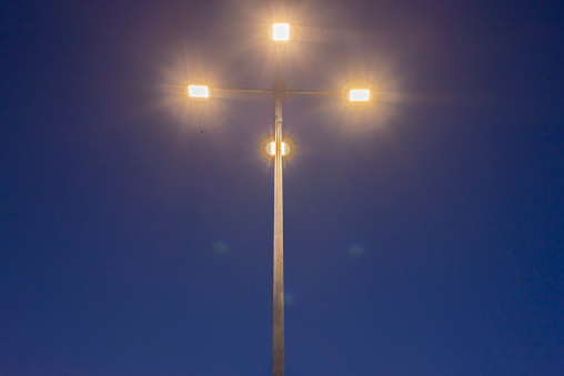 electric pole lighting at night