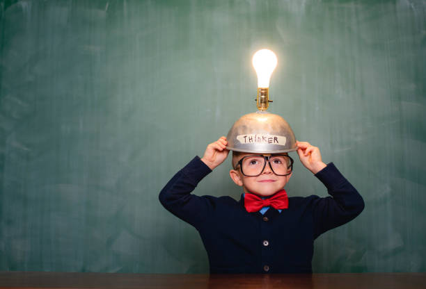 istock Young nerd boy with thinking cap full of ideas 1767318051