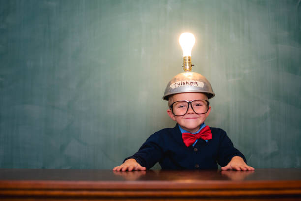 istock Young nerd boy with thinking cap full of ideas 1767318065