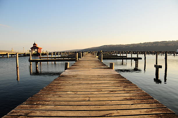 istock wooden pier with blue sky 176731944