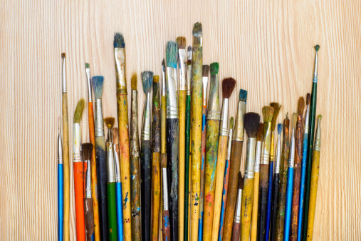 Set of paint brushes on the desk