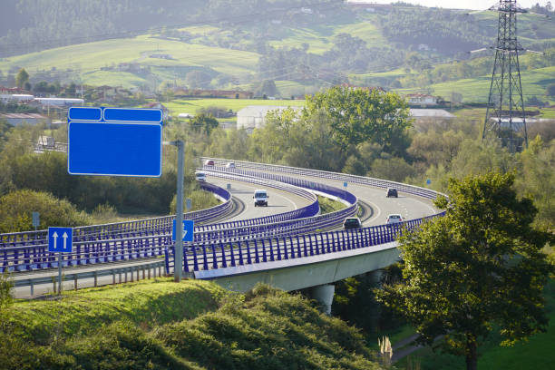 istock Cars driving by a highway 1767343827