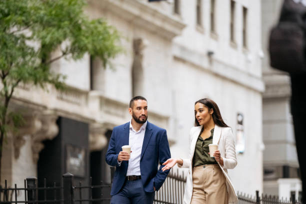 istock Manhattan financial team exchanging ideas on coffee break 1767347750