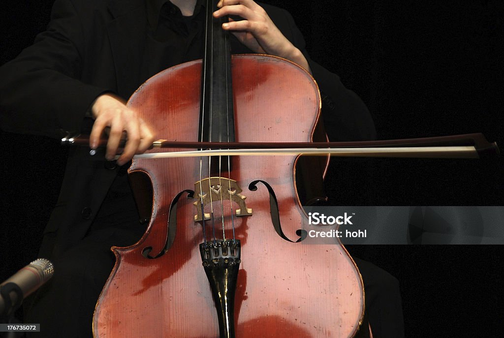 in concert cello player - detail with recording microphone Bow - Musical Equipment Stock Photo