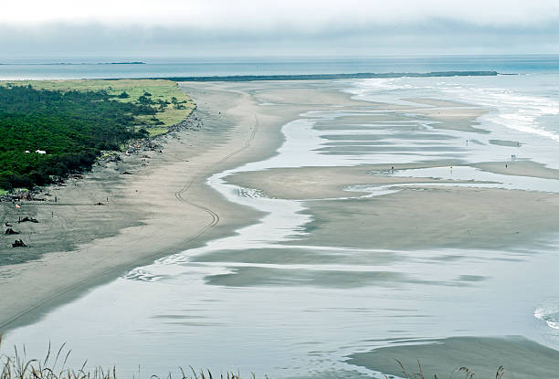 istock Sand beach where ocean meets river in Washington state 176735456