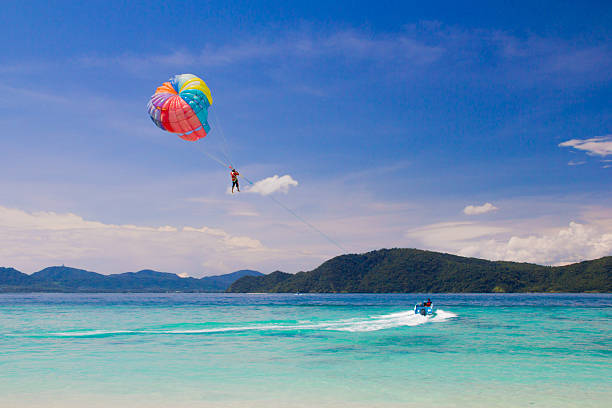 Parasailor Parasailor Activity on Beautiful  blue sea in thailand parasailing stock pictures, royalty-free photos & images